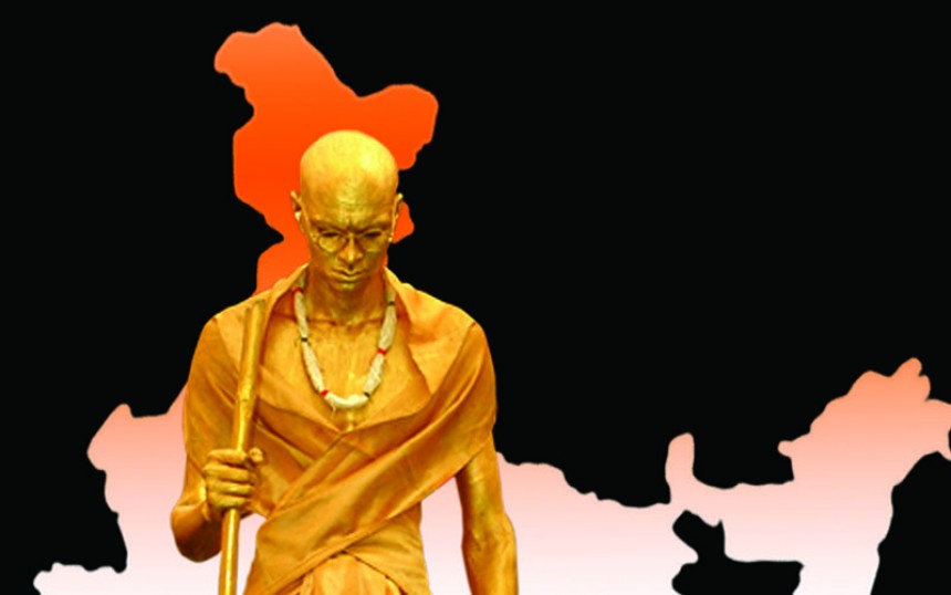 Posed As a Golden Statue of Mahatma Gandhiji